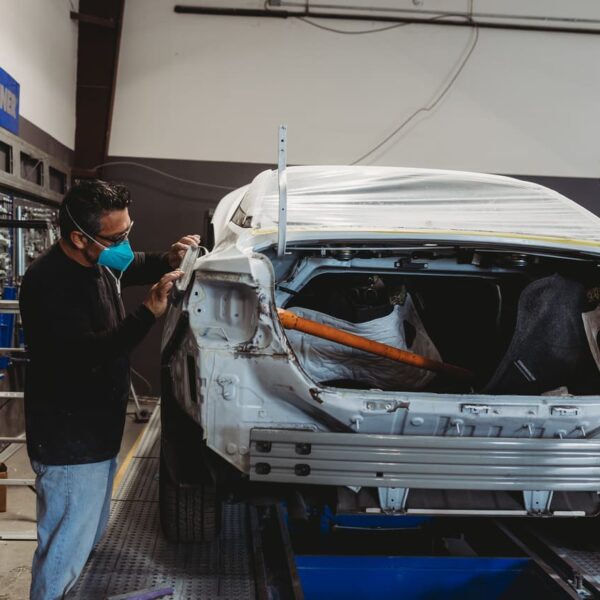 a car undergoing body work by OEM ASE Certified technicians at the best auto body shop in Hosuton, TX