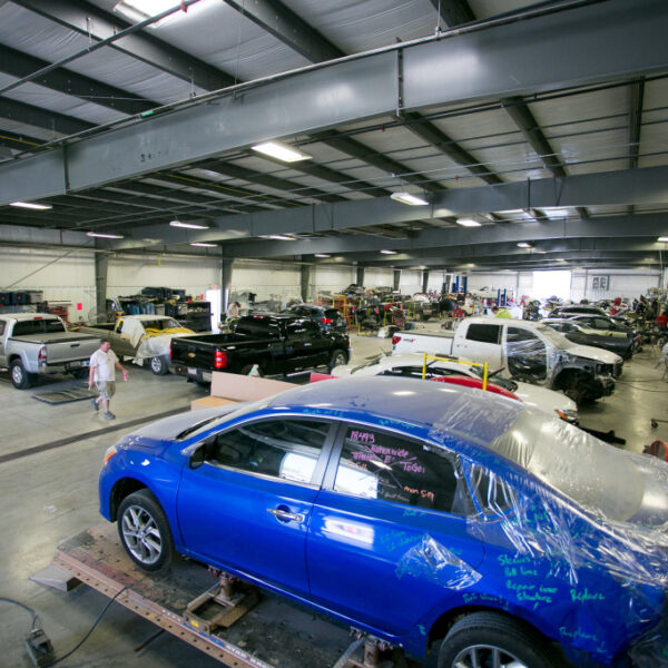 top rated auto body shop in Houston, TX with full shop of various car makes and models.